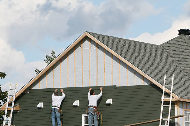 Professional Siding Installation technician working in Boonville, IN